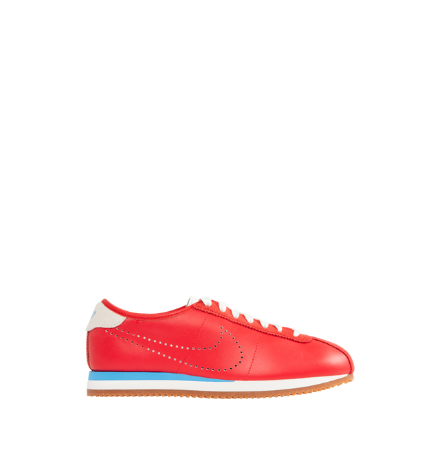 Image 1 of 5 - RED - NIKE Cortez Sneaker featuring leather upper with suede trim and rubber gum sole, lace-up front, embroidered Nike logo on tongue, perforated signature swoosh at sides and embroidered logo at back counter.