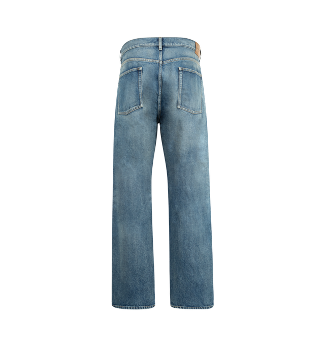 Image 2 of 3 - BLUE - SAINT LAURENT Tapered Jeans featuring mid-rise, five-pocket style, certified cotton, a tapered leg, button fly, waistband with belt loops and logo embossed leather jacron. 100% cotton. Made in Japan.
