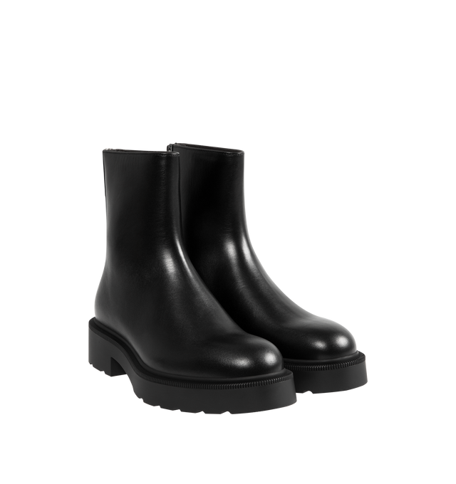 Image 3 of 4 - BLACK - THE ROW Nobilis Fast Boot featuring versatile ankle boot in polished calfskin leather with round toe, back zipper closure and treaded rubber platform sole. 100% calfskin leather. Synthetic sole. Made in Italy.
