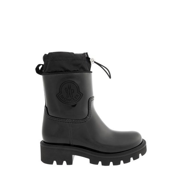 Image 1 of 4 - BLACK - MONCLER Kickstream Rain Boots featuring PVC and nylon upper, fabric insole, TPU welt, EVA tread, drawstring fastening and waterproof. Calf height 20 cm. Sole height 4 cm. 100% polyvinyl chloride. Lining: 80% polyamide/nylon, 20% elastane/spandex. Sole: 100% elastodiene. Made in Italy.