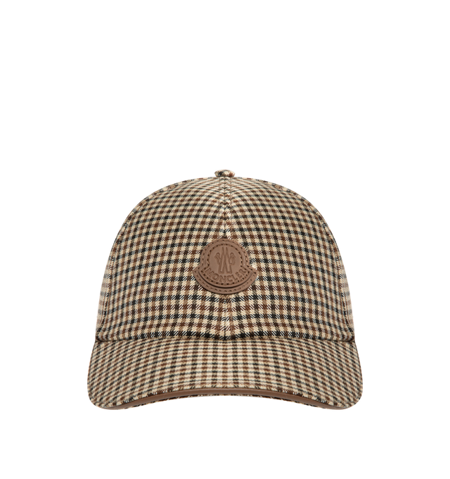 Image 1 of 2 - BROWN - Moncler Mens Wool Check Baseball Cap is crafted from virgin wool check fabric. Features a classic baseball cap silhouette, leather patch with embossed logo, elasticized back closure, and cotton lining. Base Fabric: 100% Virgin Wool; Lining: 100% Cotton; Secondary Material: 88% Polyester, 12% Elastane/Spandex; Leather Tag: Cow Leather; Leather Inserts: Cow Leather. Made in Italy.
