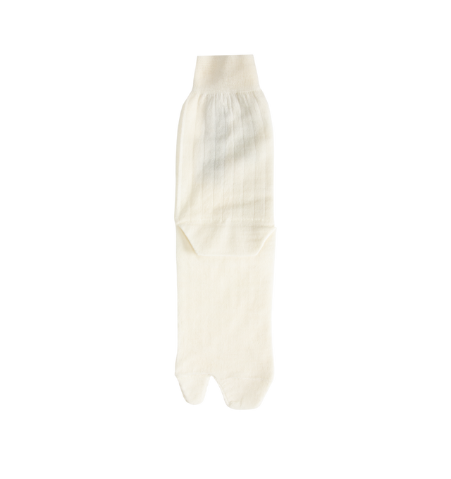 Image 1 of 2 - WHITE - Maison Margiela Tabi Socks are crafted from a wool-blend jersey and feature the Maison's iconic split-toe construction inspired by traditional Japanese tabi socks. Designed with ribbed cuffs, a mid-calf length silhouette, and the signature single white stitch at the back, these socks combine comfort with a distinctive archival design. Main Material: 78% Wool, 22% Polyamide. Made in Italy.
