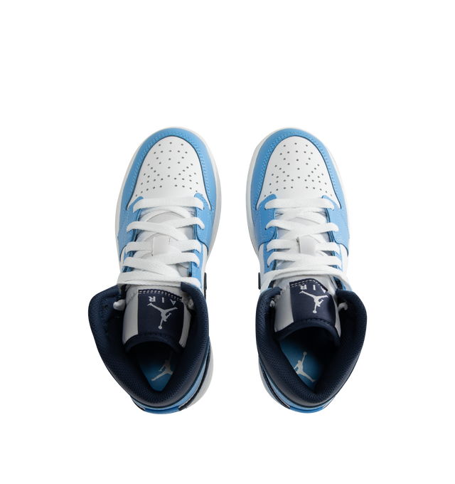 Image 5 of 5 - BLUE - Men's Air Jordan 1 Mid Sneakers feature a leather, synthetic leather, and textile upper with the iconic mid-top silhouette for a timeless heritage look. These lifestyle sneakers combine lightweight Nike Air cushioning, a foam midsole, and a durable rubber outsole with a pivot-circle traction pattern for lasting comfort, support, and reliable grip. Main Material: Leather, Synthetic Leather, and Textile. Midsole: Foam with Nike Air Cushioning. Sole: Rubber.