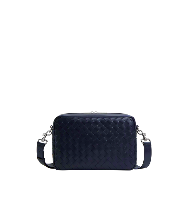Image 1 of 4 - NAVY - BOTTEGA VENETA Intrecciato Camera Bag featuring cross-body bag in Intrecciato leather with detachable strap, metal D-ring, one interior zipped pocket with leather trimming, one open pocket in canvas and zipper closure. 7.7" x 11.4" x 3". Calfskin. Lining: canvas. Made in Italy.