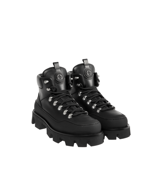 Image 2 of 4 - BLACK - MONCLER Peak Trek Leather Ankle Boots featuring leather upper, leather insole, lace-up closure and rubberized TPU sole with EVA filler. Calf length 13cm. Sole height 5cm.