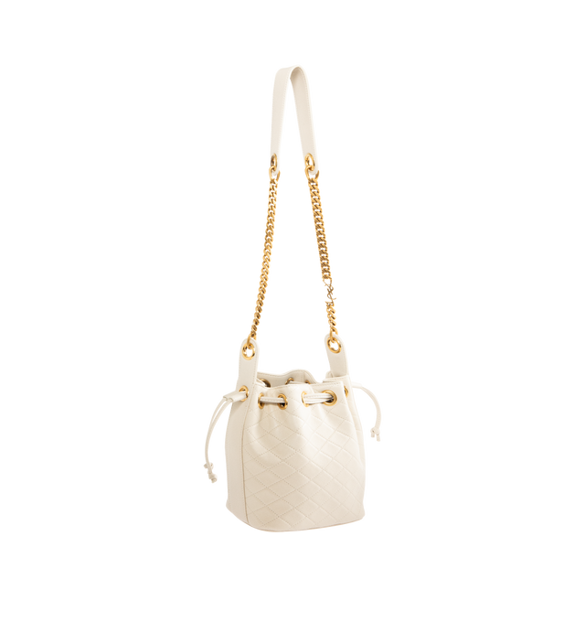 Image 2 of 3 - WHITE - SAINT LAURENT Chain Bucket Bag in quilted lambskin featuring a jewelry chain strap for shoulder carry, leather lining, bronze-tone hardware and drawstring closure. 6.3" x 7.1" x 3.9". Strap drop: 15.7". Lambskin. Made in Italy.