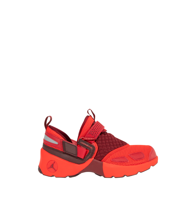 Image 1 of 5 - RED - JORDAN Trunner LX Sneaker featuring synthetic leather, canvas and airy knits to give durability, structure and breathable comfort, chunky foam midsole, rubber outsole and reflective details.