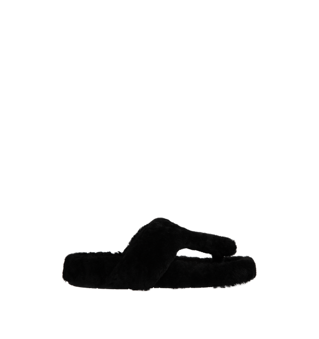Image 1 of 4 - BLACK - LOEWE Ease Shearling Thong Sandals featuring thong strap, slide style and sheep shearling. Made in Italy.  