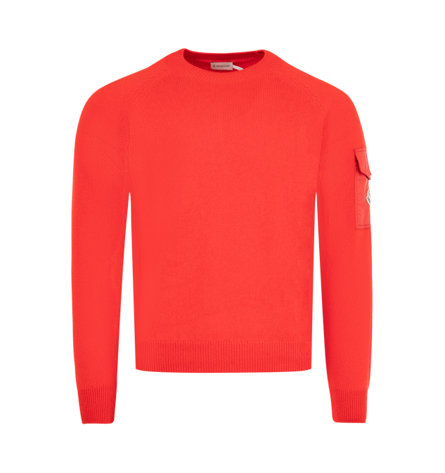 Image 1 of 3 - RED - MONCLER Moulin Wool & Cashmere Sweater featuring wool and cashmere blend moulin, stockinette knit, gauge 7, crew neck, longue saison sleeve pocket with snap button closure and logo patch. 90% virgin wool, 10% cashmere. Made in Moldova.