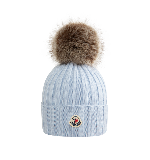 Image 1 of 2 - BLUE - MONCLER Wool Beanie with Pom Pom featuring Merino wool, ribbed knit and faux fur pom pom. 100% virgin wool.