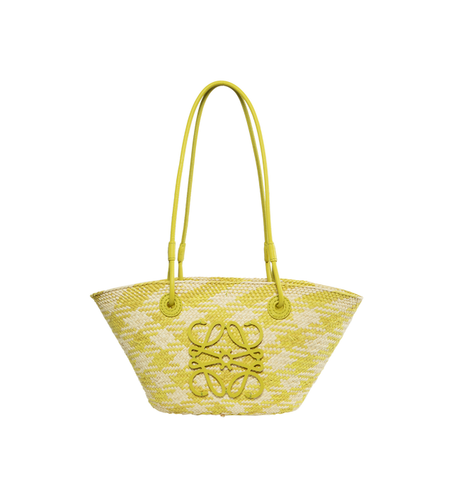 Image 1 of 3 - NEUTRAL - Loewe Paula's Ibiza Small Checks Anagram Basket Tote with a classic handwoven body, tubular calfskin straps and top handles, and embroidered calfskin Anagram. This small version is adorned with a two-tone checks pattern and is made in Spain using iraca palm that is cultivated, harvested, sun-dried and woven in Colombia by local artisans. Featuring shoulder or top handle carry, calfskin tie closure. Height (inch): 6.7 X Width (inch): 15 X Depth (inch): 5.1. Made in Spain.Loewe Paula' 