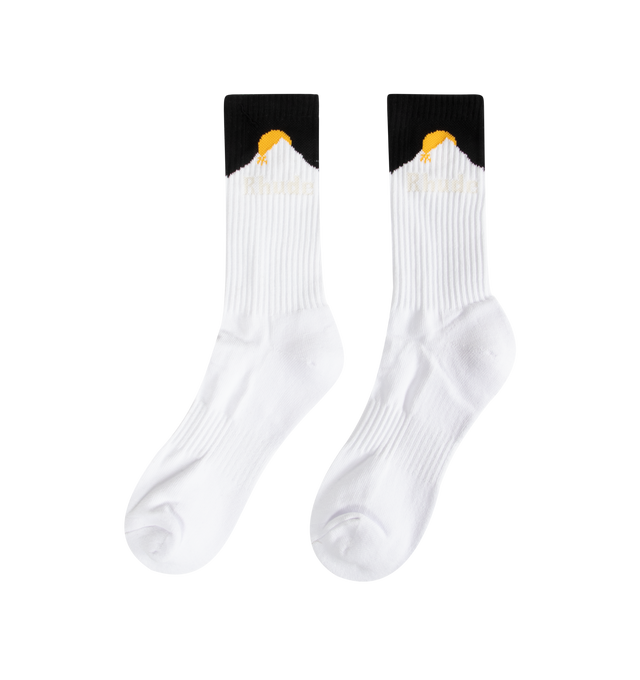 Image 2 of 2 - WHITE - Rhude Mens Sport Socks are crafted from a cotton, polyester, and spandex blend. Feature a ribbed jersey construction and signature vertical Rhude logo. Main Material: 80% Cotton, 12% Polyester, 8% Spandex. Made in China.