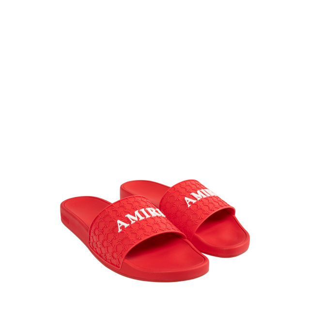 Image 2 of 4 - RED - AMIRI MA Quad Pool Slide Sandals featuring TPU pool slide sandals with raised MA quad monogram, contrast logo vamp, flat heel, open toe, slide style and rubber outsole.