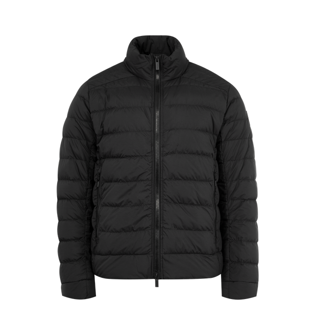 Image 1 of 3 - BLACK - CANADA GOOSE Crofton EnduraLuxe Jacket featuring two-way zipper, packable into interior left pocket, converts into a cinchable bag with a carrying strap, removable interior backpack straps for hands-free carrying capabilities, interior drawcord at hem, two exterior tricot-lined zippered hand pockets and one interior drop-in pocket. 100% recycled polyamide. Made in Canada.