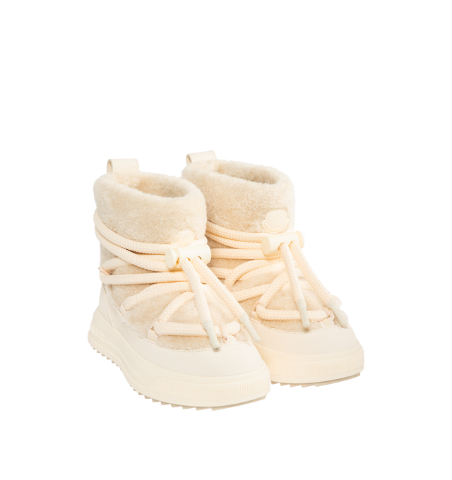 Image 2 of 4 - WHITE - MONCLER Altive Mid Snow Boots featuring nylon and textured rubber upper, mesh insole, drawstring fastening, TPU sole and Vibram Megagrip rubber tread. 16 cm calf length. Sole height 4.2 cm. 87% polyamide/nylon, 13% elastane/spandex; Lining: 100% polyamide/nylon. Sole: 100% elastodiene.