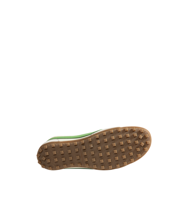 Image 4 of 5 - GREEN - Nike Men's Moon Shoe OG SP Sneakers feature a Sail, Light Bone, and Chlorophyll nylon upper with a leather Swoosh. Inspired by Nike's original 1970s running shoe, the streamlined silhouette is set on a rubber Waffle outsole for durable traction. Upper: Nylon and Leather. Sole: Rubber.