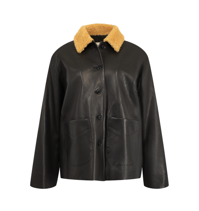 Image 1 of 3 - BLACK - Khaite Women's Wilson Caban Jacket is crafted from robust grained nappa lambskin and features a relaxed caban silhouette inspired by classic workwear. Designed with a curly lambskin shearling collar, button-front closure, graphic stitching, back yoke, quilted lining, duck down insulation, and oversized patch pockets for added functionality. Main Material: 100% Lambskin. Made in Italy.