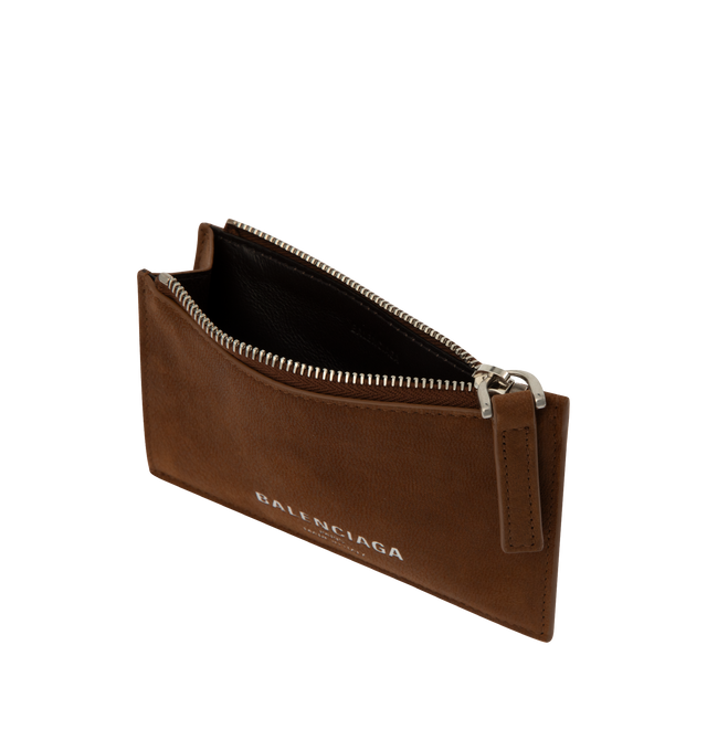 Image 3 of 3 - BROWN - Balenciaga Long Coin & Card Holder is crafted from vintage goatskin leather. Features a zip coin pouch, receipt compartment, five card slots, aged-silver hardware, and debossed Balenciaga Paris logo with silver foil at the front. Main Material: 100% Goatskin Leather. Made in Italy.