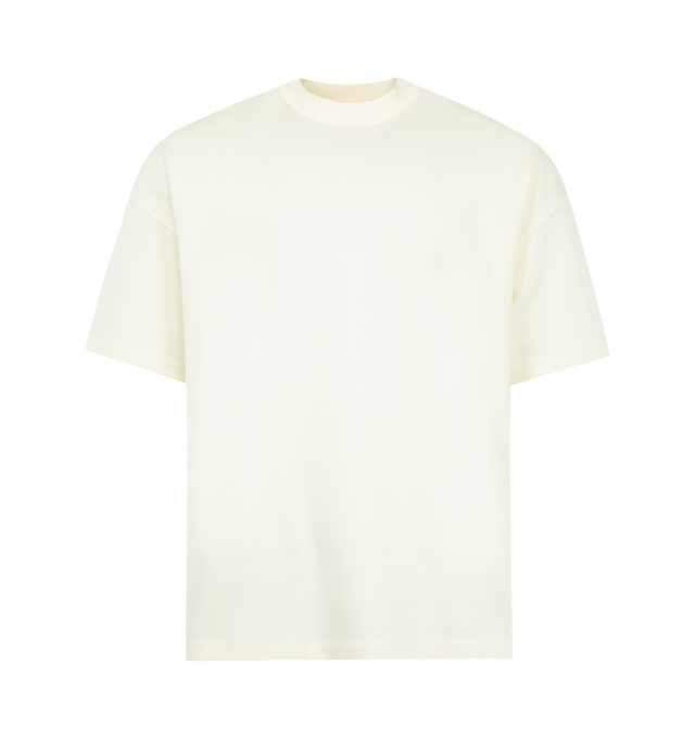 Image 1 of 2 - WHITE - FEAR OF GOD ESSENTIALS Signature 90s Pique Tee featuring medium-weight cotton/poly pique kni, crewneck, 90s fit with oversized proportions and dropped shoulders, embroidered Essentials signature logo on the front and Essentials signature label at the back collar. 80% cotton, 20% polyester.