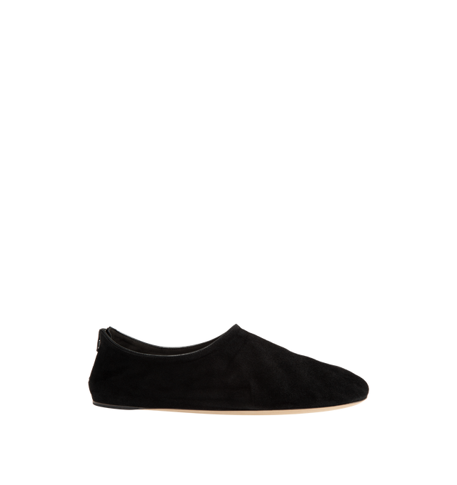 Image 1 of 4 - BLACK - The Row Women's Stellene Slipper is crafted from ultrasoft goatskin suede and features a minimal silhouette with a round toe, back zip closure, and a thin leather sole. Designed for everyday elegance, this streamlined style is lined in goatskin leather and finished with a supple suede upper for exceptional comfort and flexibility. Main Material: 100% Goatskin Suede. Lining: 100% Goatskin Leather.