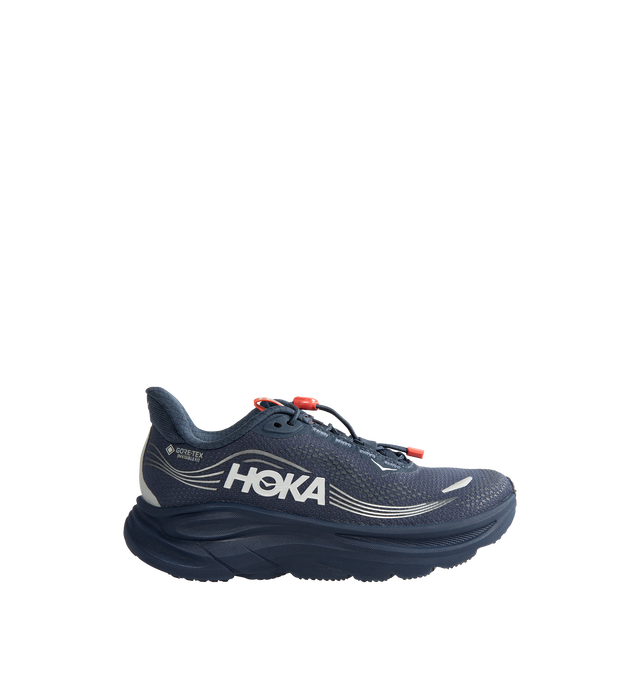 Image 1 of 5 - NAVY - Hoka Women's Clifton 11 GTX Running Sneakers feature a closed-mesh upper with a GORE-TEX Invisible Fit membrane and PFC-free water-repellent treatment. An adjustable speed-lace system with toggle, reflective details, a compression-molded EVA midsole, and a Durabrasion rubber outsole with forefoot traction pods complete the weather-ready design. Upper: Mesh with GORE-TEX Membrane. Midsole: EVA Foam. Sole: Rubber. Heel-to-Toe Drop: 8 mm.