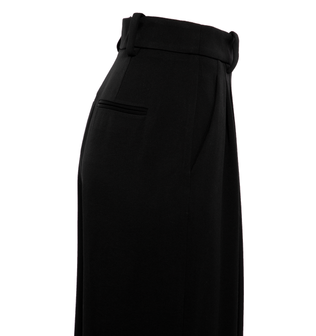 Image 3 of 4 - BLACK - KHAITE Simone Pant featuring mid-rise, reverse pleats, relaxed leg, wider waistband, inset side pockets, and welt pockets. 77% virgin wool, 23% viscose. 
