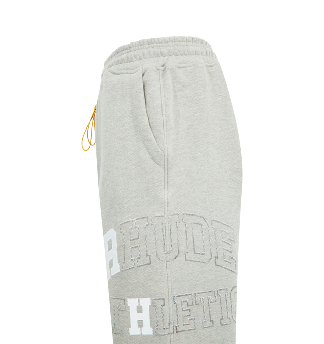 Image 3 of 3 - GREY - RHUDE Athletic Sweatpant featuring drawstring waistband, 3-pocket styling, drawstring hem and logo on leg. 100% nylon. Made in USA.