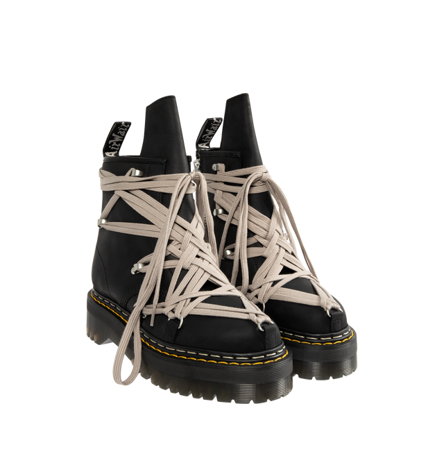 Image 2 of 4 - BLACK - RICK OWENS X DR. MARTENS Megalace Leather Platform Boots featuring signature megalacing system across the black, waxy leather upper with an extended geometric tongue, an easy-access inner zip, special edition AirWair heel loop and stacked on imposing Quad sole with a white and yellow double welt stitch.
