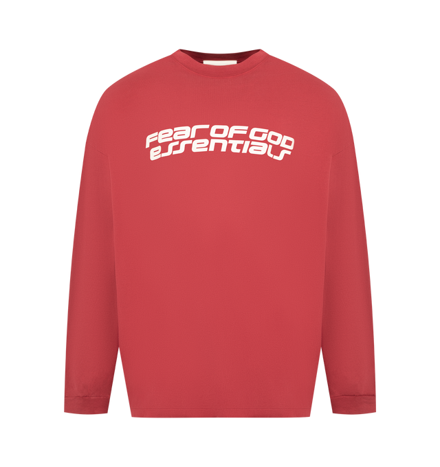 Image 1 of 3 - RED - Fear of God Essentials 90's Long Sleeve Tee is made from 100% cotton jersey, offering a soft yet substantial hand feel. Designed in an oversized 90s-inspired silhouette, it features exaggerated proportions with dropped shoulders for a relaxed drape that tapers to rib-knit cuffs. The front is defined by a HD print application of the Fear of God Essentials lockup alongside the Essentials logos on the sleeves. The signature rubberized Fear of God Essentials label at the collar.Fit Note: Si