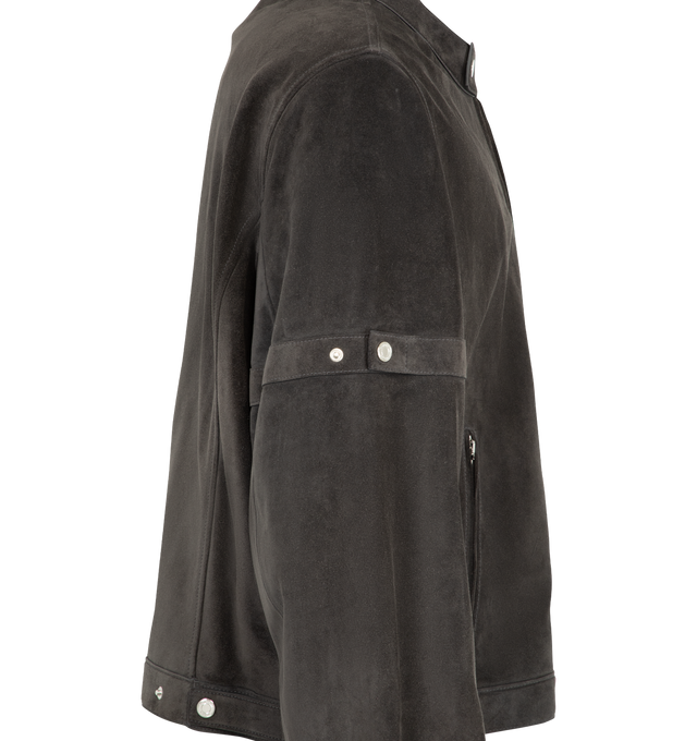 Image 3 of 3 - GREY - Thom Browne Men's Leather Racer Jacket is crafted from calf leather and reimagines the classic racer silhouette through clean lines and refined detailing. Designed with a hidden two-way zip closure, the jacket features a stand collar with a snap-fastening tab, concealed zip hand pockets, an internal pocket, and self snap-fastening armbands that reference the brands signature codes. Zip sleeve vents with snap-tab cuffs, side adjusters, detachable internal backpack straps, and a signatur