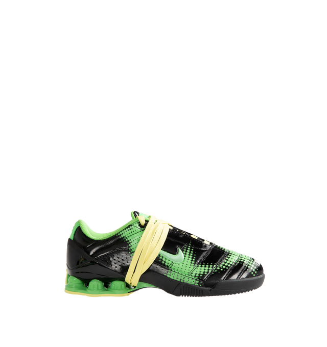 Image 1 of 5 - GREEN - Nike Women's Total 90 Shox Magia Sneakers feature a premium nubuck leather upper with oversized laces and printed graphic detailing, combining the iconic design of the Total 90 with a sleek, tonal finish. Inspired by early-2000s soccer style, these lifestyle sneakers pair signature Nike Shox cushioning with a durable rubber outsole for responsive comfort and everyday wear. Main Material: Nubuck Leather. Midsole: Nike Shox. Sole: Rubber.