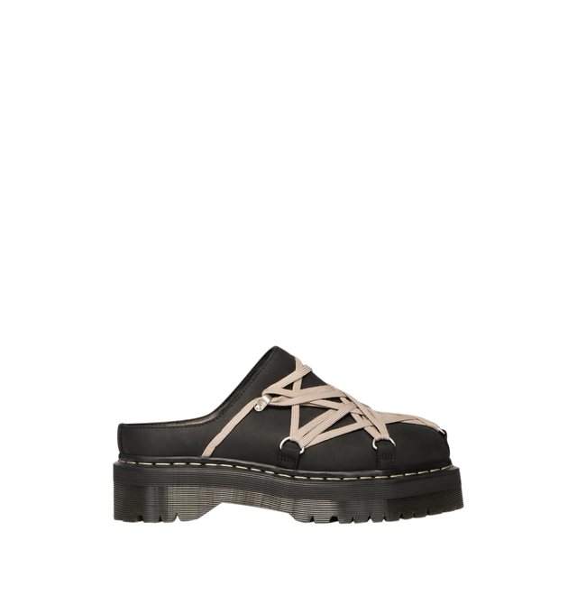 Image 1 of 5 - BLACK - Dr. Martens x Rick Owens FW26 Quad Sole Megalace Mule in Nubuck Leather. These Women's Dr. Martens mules are reimagined by Rick Owens and feature pearl Megalace lacing and palladium-finish hardware, including eyelets and hooks. They are finished with a Quad sole and a yellow and pearl welt stitch. This heavyweight nubuck cow leather has a flat, matte surface finish and an oily handfeel. Material: Upper: 100% Cow Leather; Upper Lining: 100% Cow Leather; Sole: 100% Polyvinyl Chloride. *