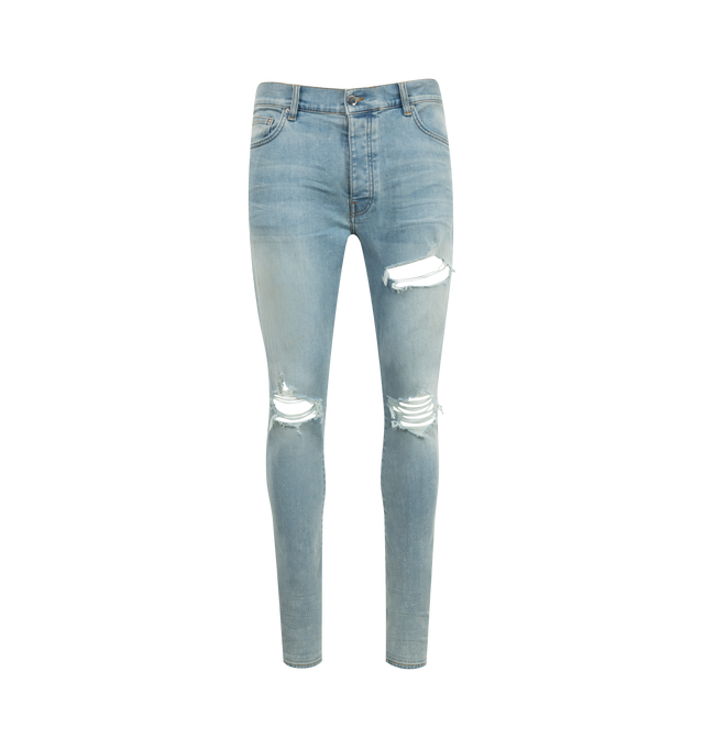 Image 1 of 3 - BLUE - Amiri MX1 Skinny Jeans are a 5-pocket style with a button and zip fly, distressing and rips overall, and a fitted silhouette with skinny legs. Polyester and elastane.