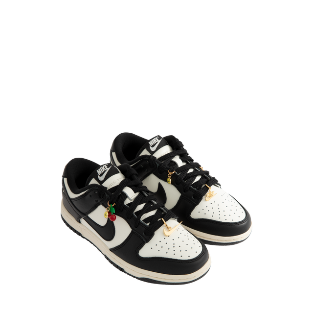 Image 2 of 5 - BLACK - NIKE Dunk Low SE Sneaker featuring charm details, plush padding, leather upper, foam midsole and rubber outsole with classic pivot circle.