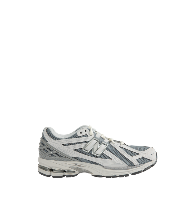 Image 1 of 5 - GREY - NEW BALANCE 1906R Sneaker featuring ACTEVA LITE midsole cushioning, ABZORB SBS heel cushioning, N-ergy outsole provides superior shock absorption, Stability Web outsole technology provides added arch support, TPU heel cage and rubber outsole. Mesh upper with synthetic overlays.