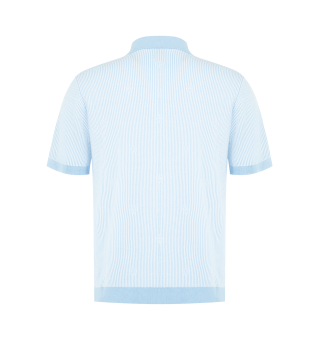 Image 2 of 2 - BLUE - Casablanca Men's Pinstripe Short Sleeve Knit Polo Shirt in a classic design featuring the house's diamond logo patch and playful motifs drawing on Egyptian iconography and Casablanca-branded elements, including the tennis ball and orange, set against a light blue pinstripe ground. Completed with a collared neckline, button closure, signature gold rim pearl buttons, and rib collar, cuffs, hem and placket detail, in a slim silhouette. 100% cotton pinstripe fabric. Made in China.
