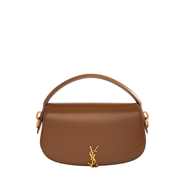 Image 1 of 3 - BROWN - SAINT LAURENT Voltaire Box Bag featuring half-moon shoulder bag in calfskin with a gently polished finish, flap with pivoting cassandre closure, an adjustable and detachable swivel-hook strap, leather lining, bronze-toned hardware and one flat pocket. 9.4" x 5.9" x 2". Handle drop: 2.4". Strap drop: 10.6". Calfskin leather. Made in Italy.