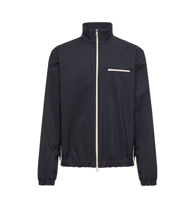 Image 1 of 1 - NAVY - MONCLER Fourioun Cotton Blend Short Jacket featuring a stretch cotton and nylon blend, nylon lining, zipper closure, zipped pockets, zipped chest pocket and logo patch. 50% cotton, 46% polyamide/nylon, 4% elastane/spandex. Made in Italy.