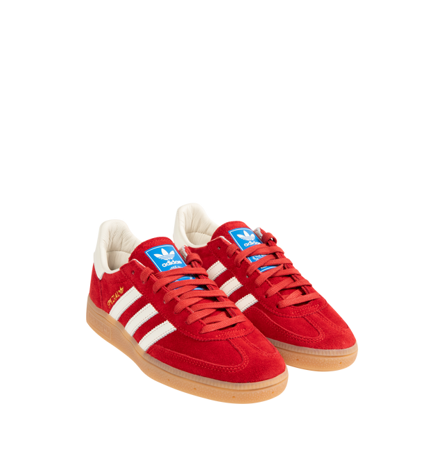 Image 2 of 5 - RED - ADIDAS Handball Spezial Sneakers featuring premium suede upper, serrated 3-Stripes and heel tab, regular fit, lace closure, leather lining and rubber outsole.