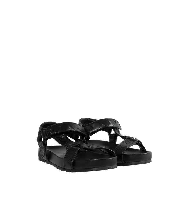 Image 2 of 4 - BLACK - BOTTEGA VENETA Leather Flat Sandals featuring ergonomic sculpted insole, round toe, VELCRO strap closure and signature intrecciato woven-pattern upper. Leather upper and lining, synthetic sole. Made in Italy. 