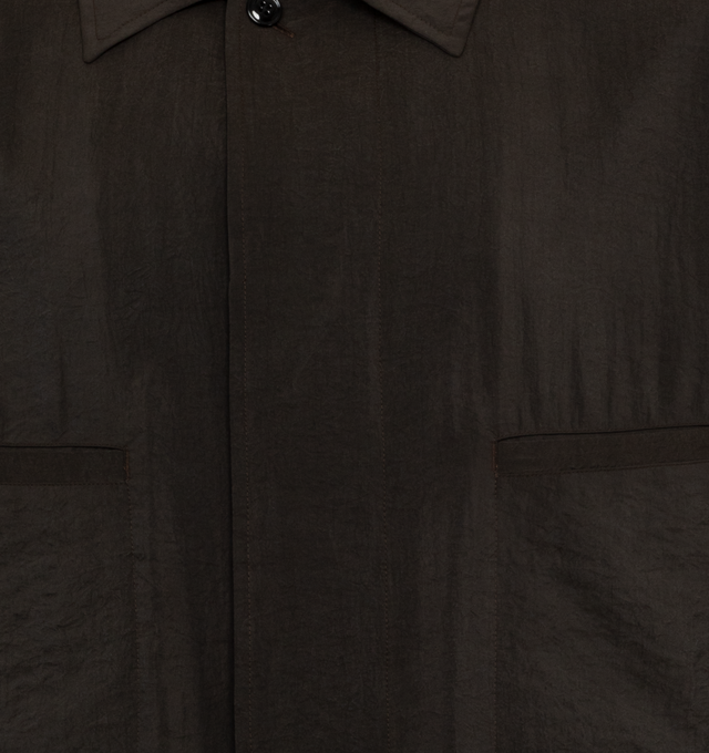 Image 3 of 3 - BROWN - LEMAIRE 4 Pocket Overshirt in Dry Silk featuring loose fit, corozo buttons, buttoned cuffs, two flap pockets and two piped pockets. 76% silk, 24% polyamide/nylon. 