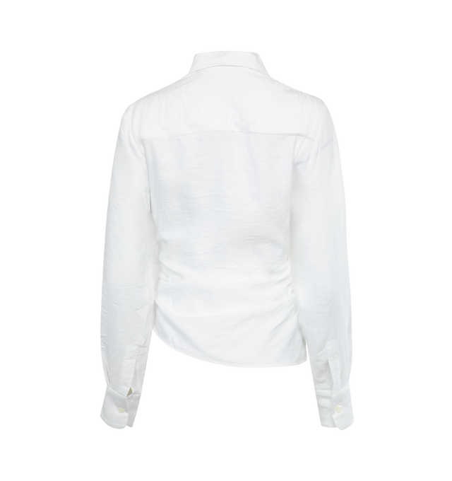 Image 2 of 2 - WHITE - JACQUEMUS La Chemise Bahia Shirt featuring twisted, straight fit, pointed collar, plunging, draped neckline, hidden button under the sewn knot, square cuffs with mother-of-pearl buttons and asymmetric hem. 88% viscose, 12% polyamide/nylon. Made in Portugal. 