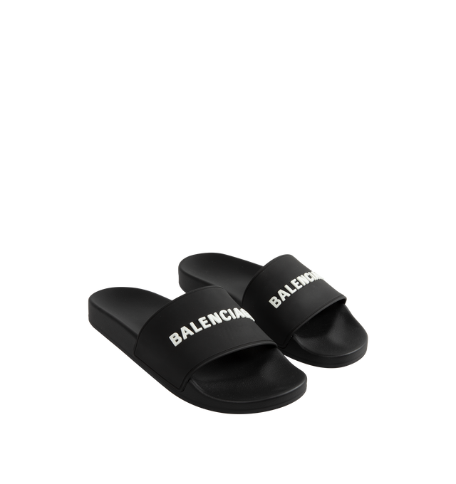 Image 2 of 4 - BLACK - BALENCIAGA rubber pool slides with contrast logotype, molded footbed and rubber sole. Made in Italy.