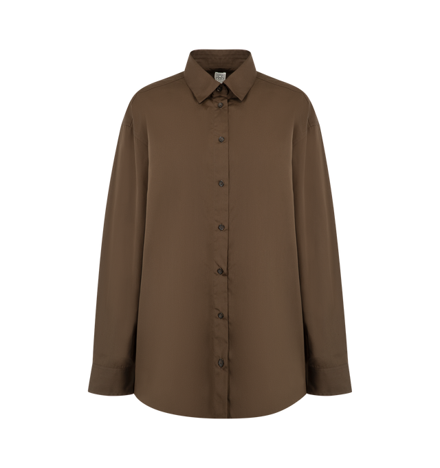 Image 1 of 2 - BROWN - TOTEME Classic Shirt featuring buttoned placket and cuffs, a long, relaxed shape finished with an inverted box pleat meticulously secured with a subtle T-stitch. 100% cotton organic.