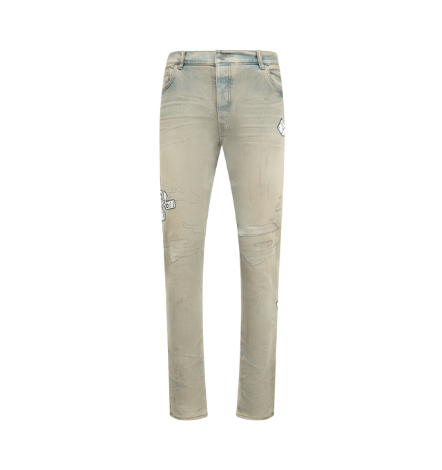 Image 1 of 3 - GREY - AMIRI Domino Applique Skinny Jeans featuring domino motif, distressed effect, skinny fit, five pockets and button fly fastening. 92% cotton, 6% elastomultiester, 2% elastane. Made In United States.