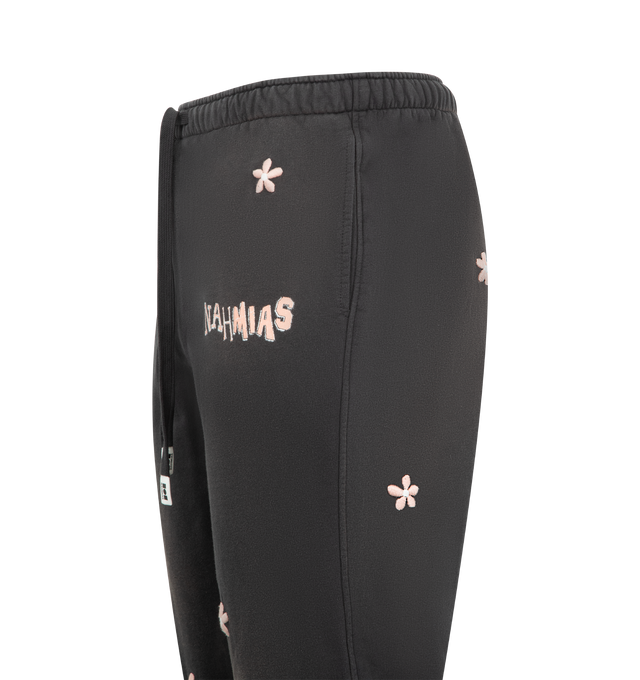 Image 4 of 4 - BLACK - NAHMIAS Flower Groms Sweatpants featuring a relaxed, wide-leg silhouette, embroidered flowers, drawstring waist, back patch pocket and pull on style. 100% cotton. Made in USA.