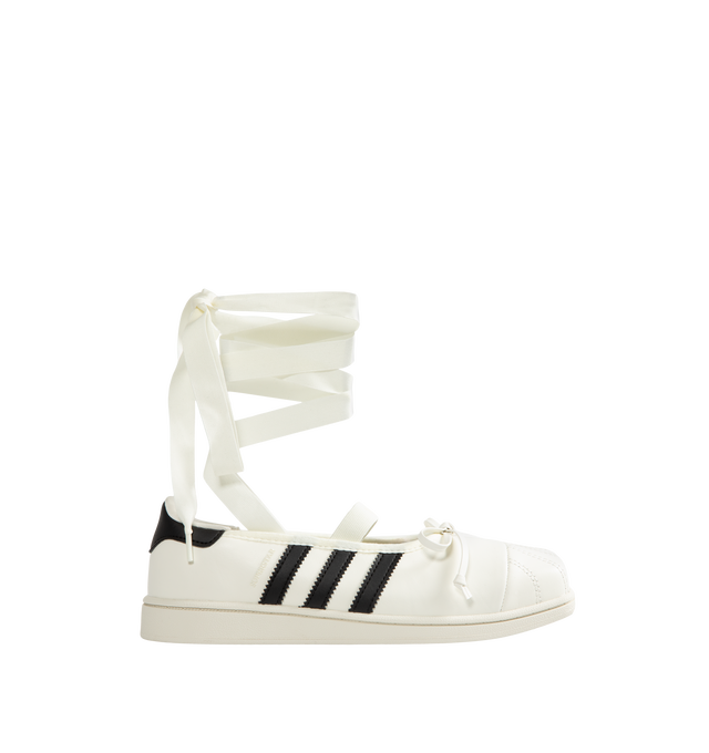Image 1 of 6 - WHITE - Adidas Women's Jennie Superstar SQ Ballet Shoes are crafted from leather and feature a low-cut silhouette, a squared shell toe, and an elastic closure for easy entry and a secure fit. Finished with a textile sockliner, signature 3-Stripes, Trefoil branding, Jennie co-branding details, and includes optional shoelaces for customization. Main Material: Leather.