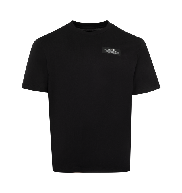 Image 1 of 2 - BLACK - AMIRI Spirit T-Shirt featuring stretch cotton jersey, rib knit crewneck, logo at chest, graphic on back and dropped shoulders. Cotton. Made in Italy.