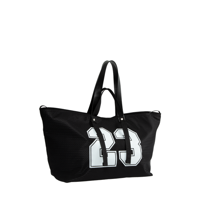 Image 2 of 3 - BLACK - OFF-WHITE DAY OFF MESH BASEBALL TOTE BAG has a textured mesh finish with a large printed logo on the front and the number 23 on the back. It features both short handles with decorative extensions and longer shoulder straps. Lining: 100% Polyester. Outer: 100% Polyester. Outer: 100% Leather. 