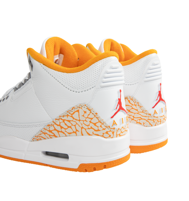 Image 3 of 5 - ORANGE - JORDAN Air Jordan 3 Retro Sneaker featuring leather upper with elephant print overlays, padded collar, Nike Air cushioning, foam midsole and rubber outsole.